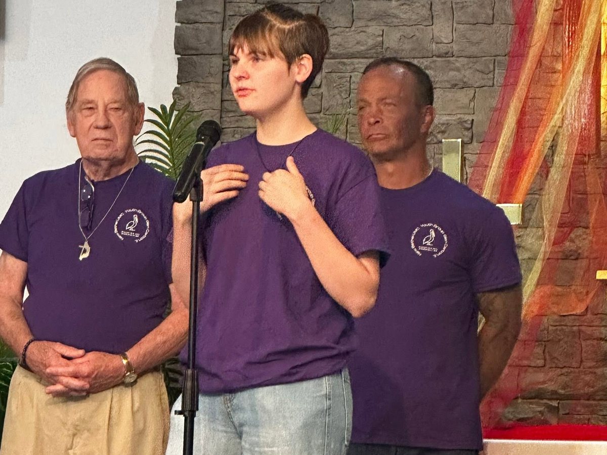 A New Bethel student sharing in front of the congregation
